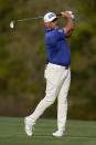 Lee Westwood, of England, hits from the fairway on the 14th hole during the third round of The Players Championship golf tournament Saturday, March 13, 2021, in Ponte Vedra Beach, Fla. (AP Photo/Gerald Herbert)