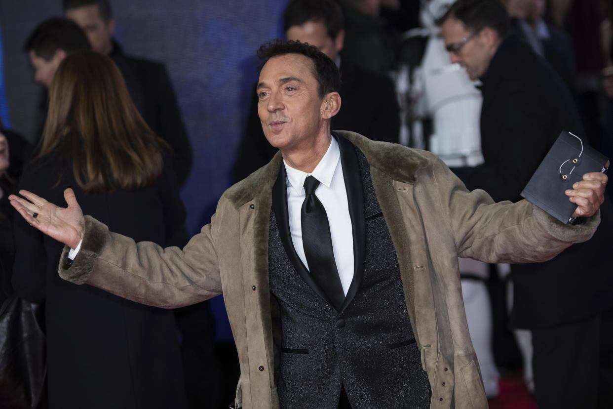 Bruno Tonioli poses for photographers upon arrival at the premiere of the film 'Star Wars: The Last Jedi' in London, Tuesday, Dec. 12th, 2017. (Photo by Vianney Le Caer/Invision/AP)