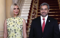 Ivanka Trump, President Donald Trump's daughter and White House adviser, and Paraguay's President Mario Abdo Benitez, pose for photos at Presidential Palace in Asuncion, Paraguay, Friday, Sept. 6, 2019. Ivanka Trump is on her third stop of a South American trip to promote women's empowerment. (AP Photo/Jorge Saenz)