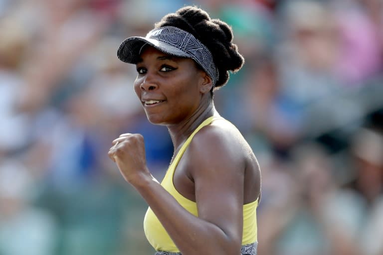 Venus Williams of the US celebrates match point against Peng Shuai of China during their BNP Paribas Open last of 16 match, at the Indian Wells Tennis Garden in California, on March 14, 2017