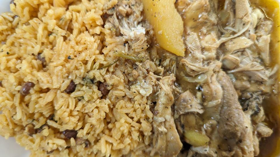 Chicken stew with Spanish rice at Caraballo Sisters on Tuesday August 8, 2023. 