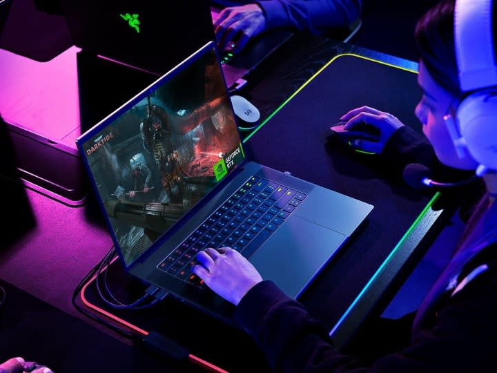 Player using Razer Blade 16 during intense gaming session.