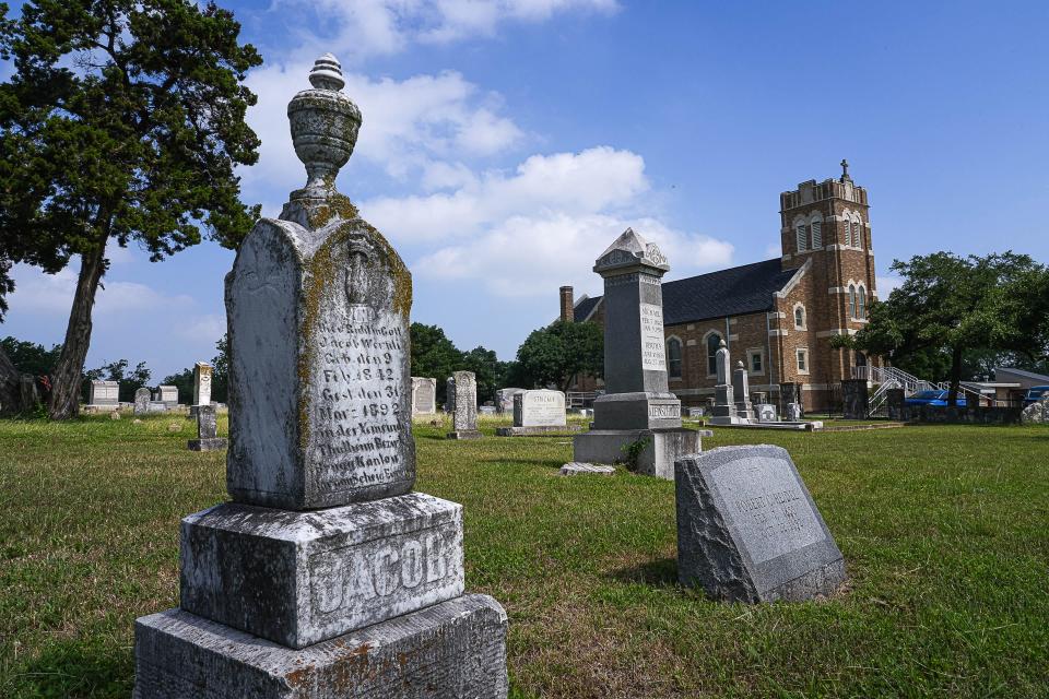 Headstones from the 1800s to the present fill the cemetery at Immanuel Lutheran.