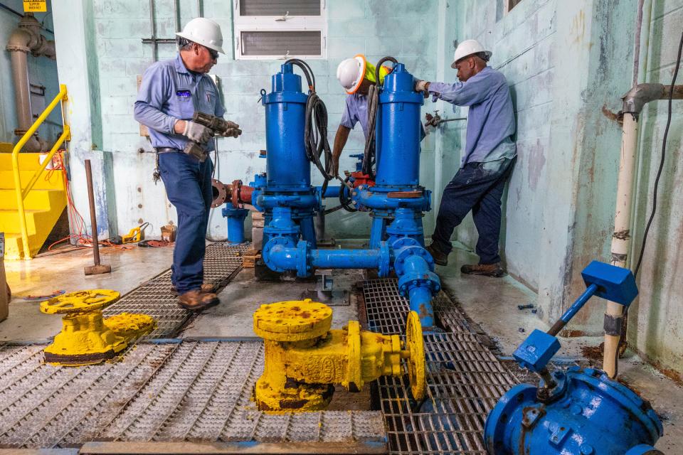 Reconfiguring pipes for a reverse osmosis system at a water facility on the east bank of Plaquemines Parish near Pointe a la Hache, La., on Friday, Sept. 29, 2023.