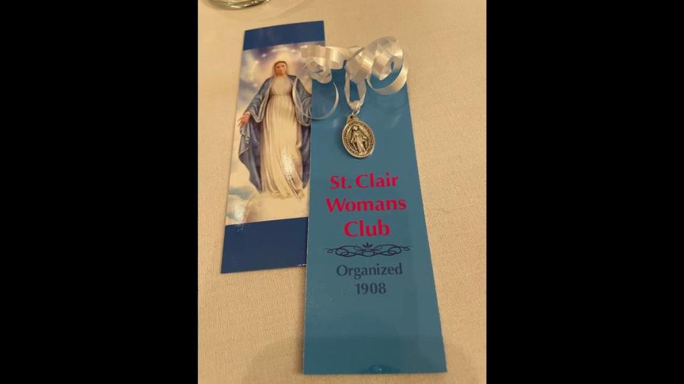 Remaining members of the St. Clair Women’s Club received a prayer card, religious medal and ribbon commemorating the organization’s 116 years and its final meeting on May 8.