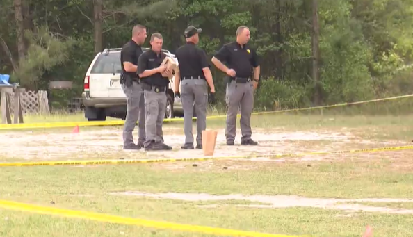 Evidence is being gathered off of Boykin Road near Shaun Lane in Clinton. (Nate Sullivan/CBS 17)
