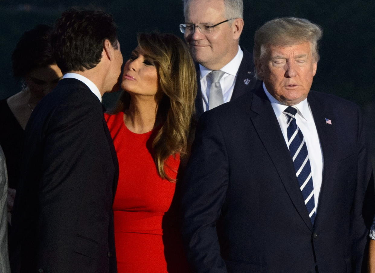 Prime Minister Justin Trudeau greets Melania Trump as she arrives for a family photo with President Donald Trump, during the G7 Summit in Biarritz, France, Sunday, Aug. 25, 2019.  (Sean Kilpatrick/Pool via AP)