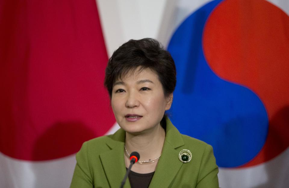 South Korean President Park Geun-hye speaks during a trilateral meeting with President Barack Obama and Japanese Prime Minister Shinzo Abe, Tuesday, March 25, 2014, at the US Ambassador's Residence in the Hague, Netherlands. (AP Photo/Pablo Martinez Monsivais)