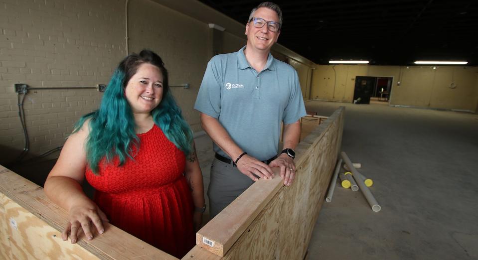 Stephanie Newman and John Searby inside the 117 Center St. building in Cramerton Thursday morning, Aug. 11, 2022.