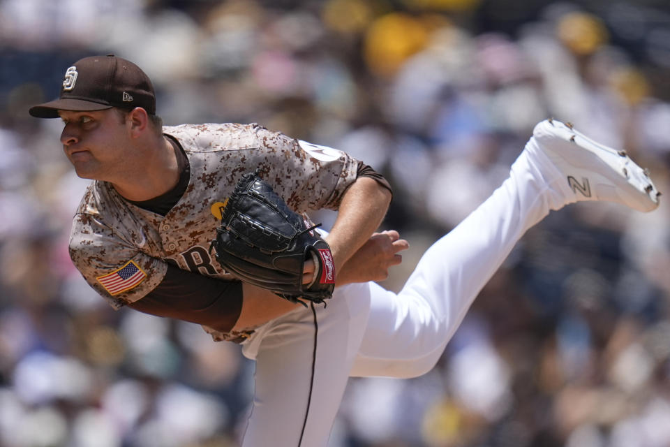 San Diego Padres starting pitcher Michael King works against a Milwaukee Brewers batter during the first inning of a baseball game, Sunday, June 23, 2024, in San Diego. (AP Photo/Gregory Bull)