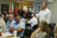 U.S. Rep. Michael Guest, R-Miss., speaks to a gathering of potential voters in Magee, Miss., June 16, 2022, as he seeks support for his runoff race against former Navy pilot Michael Cassidy in the Republican primary of Mississippi's 3rd Congressional District. (AP Photo/Rogelio V. Solis)