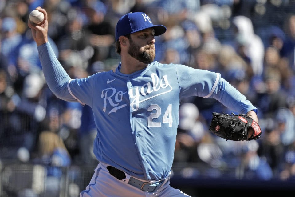 Kansas City Royals starting pitcher Jordan Lyles throws during the first inning of a baseball game against the Minnesota Twins Saturday, April 1, 2023, in Kansas City, Mo. (AP Photo/Charlie Riedel)