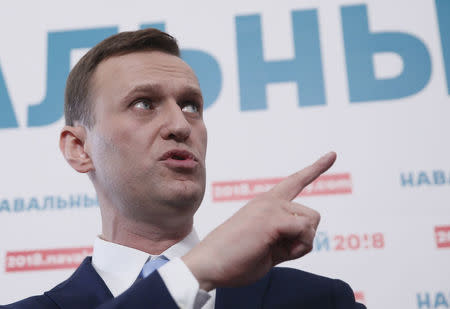 Russian opposition leader Alexei Navalny delivers a speech during a meeting to uphold his bid for presidential candidate, in Moscow, Russia December 24, 2017. REUTERS/Maxim Shemetov