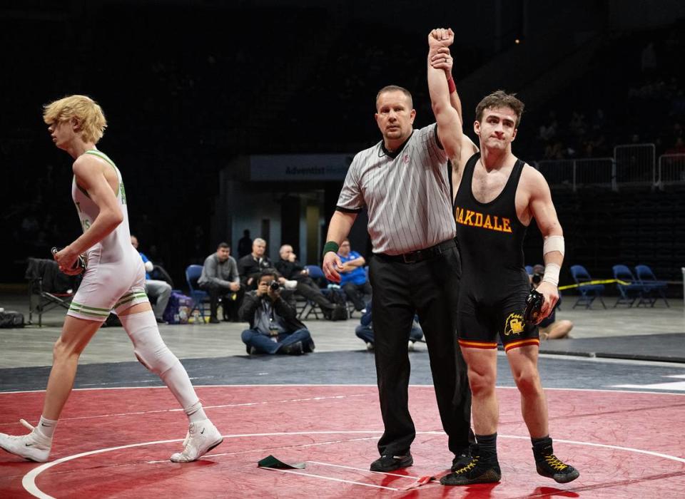 Oakdale’s Eziequel Vela pinned Kyle Holtberg of St. Mary’s at 1:29 for the126-pound title in the Sac-Joaquin Section Masters Wrestling Championships at Stockton Arena in Stockton, Calif., Saturday, Feb. 17, 2024.