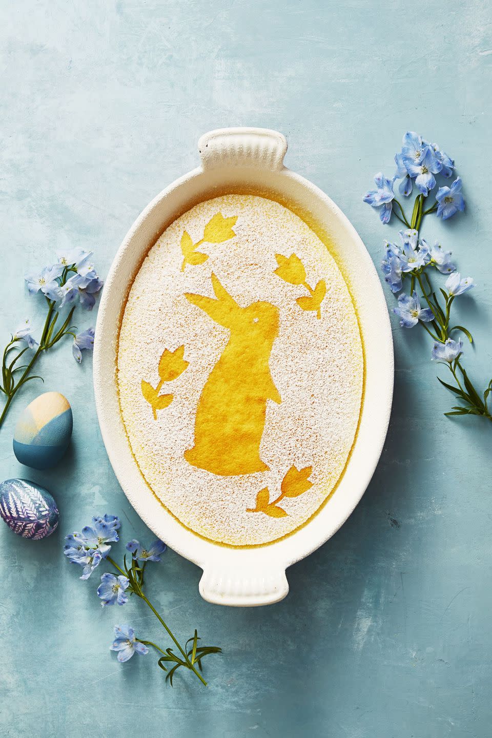 <p>Take our word for it: This lemon custard cake is just as beautiful sans Easter bunny decoration.</p><p>Get the <a href="https://www.goodhousekeeping.com/food-recipes/dessert/a48172/lemon-pudding-cake-recipe/" rel="nofollow noopener" target="_blank" data-ylk="slk:Lemon Pudding Cake recipe;elm:context_link;itc:0;sec:content-canvas" class="link "><strong>Lemon Pudding Cake recipe</strong></a><em>.</em></p>