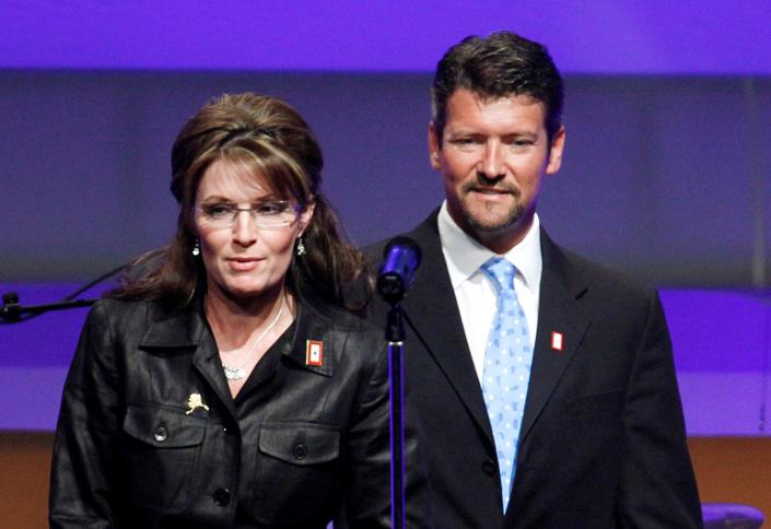 In this June 8, 2009, file photo, Republican Alaska Gov. Sarah Palin and her husband Todd Palin arrive at a Republican congressional fundraiser in Washington.  Court documents appear to show that the husband of former Alaska governor and 2008 Republican vice presidential nominee Sarah Palin is seeking a divorce. The papers, which provide only initials, were filed Friday by T.M.P. against S.L.P. Todd Palin's middle name is Mitchell and Sarah Palin's middle name is Louise.
The documents say the couple married Aug. 29, 1988 — the same as the Palins. Birthdates for the two also correspond.
 (AP Photo/Manuel Balce Ceneta, File)