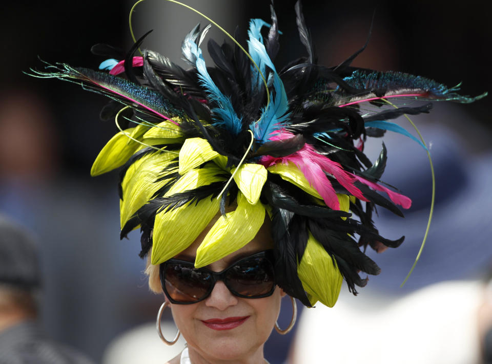 A woman wears a fancy hat&nbsp;at the 2012 derby.&nbsp;