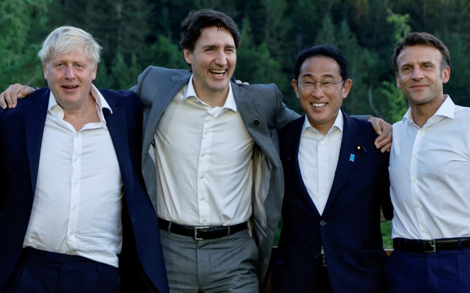 Boris Johnson, Justin Trudeau, Fumio Kishida and Emmanuel Macron - Reuters/Jonathan Ernst