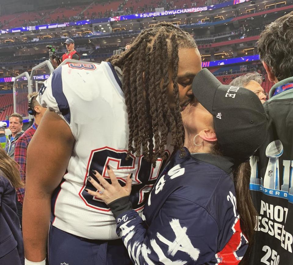 <p>LaAdrian Waddle and his wife Lauren celebrate with a kiss after defeating the Los Angeles Rams. (Instagram/shelbywaddle) </p>