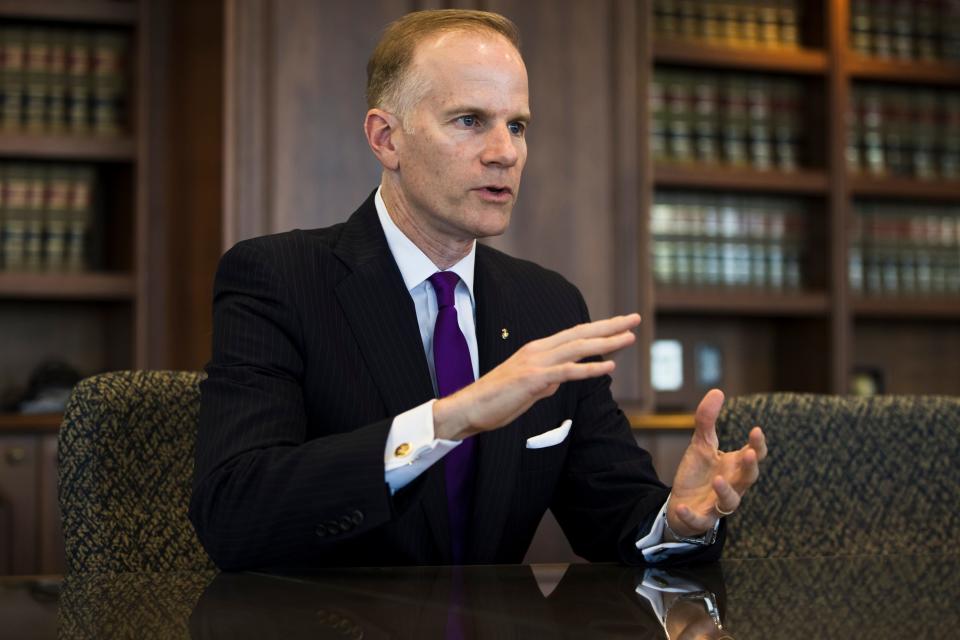 In this Oct. 17, 2018 photo, U.S. Attorney William McSwain speaks during an interview with The Associated Press in Philadelphia. McSwain has filed suit to stop a nonprofit from opening a safe injection site to address the city's opioid problem. (AP Photo/Matt Rourke)