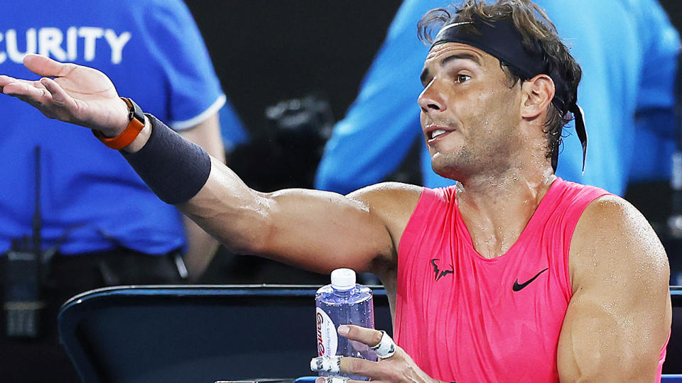 Rafael Nadal talks to the chair umpire during his quarterfinal match against Dominic Thiem. (Photo by Darrian Traynor/Getty Images)