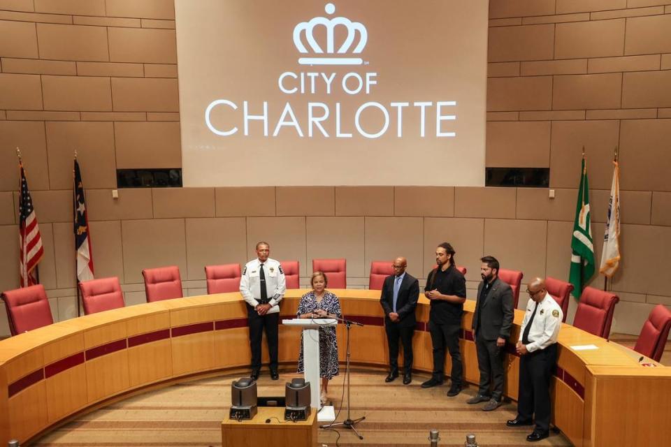 Charlotte Mayor Vi Lyles, center, extends her condolences to the families who lost loved ones, as well as extending a thank you to the fire and police department’s efforts with the five-alarm fire that tore through a construction site Thursday in South Park.