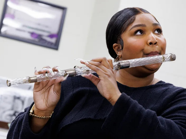 Lizzo plays President James Madison's crystal flute in the flute vault at the Library of Congress on Sept. 26, 2022.