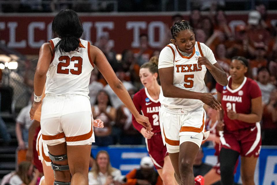 Texas forward DeYona Gaston celebrates a basket during Sunday's second-round win over Alabama in the NCAA Tournament at Moody Center. The top-seeded Longhorns will need to win two games in Portland, Ore., this weekend to advance to the Final Four.