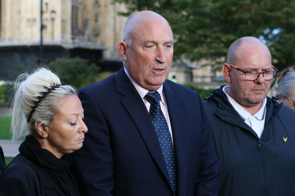 Harry Dunn's mother Charlotte Charles and father Tim Dunn with family spokesman Radd Seiger: PA