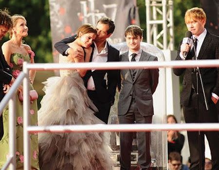 Emma Watson is comforted by David Heyman. Image credit: Getty Images.