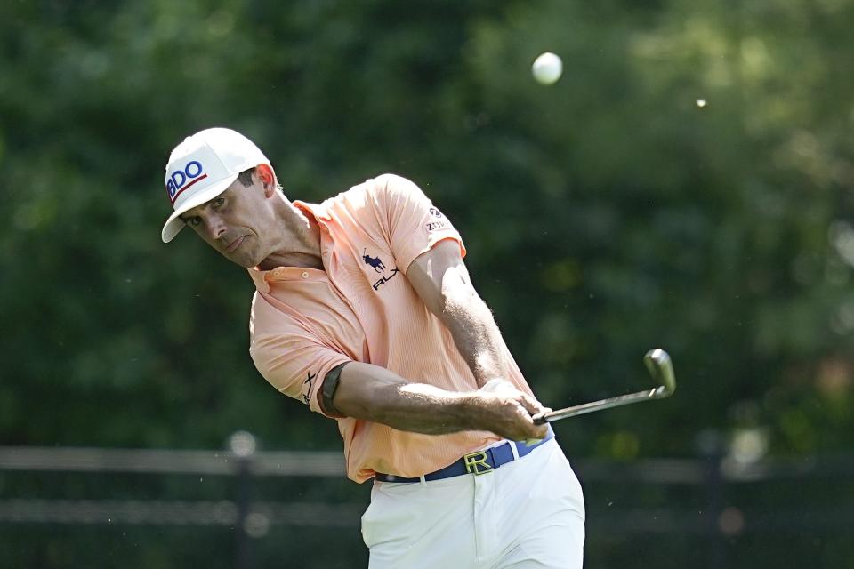 Billy Horschel hits to the 13th green during the first round of the Memorial golf tournament, Thursday, June 1, 2023, in Dublin, Ohio. (AP Photo/Darron Cummings)