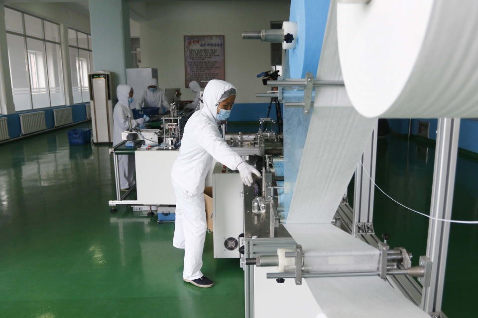 Employees of the Ryugyong Necessities Factory produce face masks in Pyongyang, North Korea, Friday, Sept. 11, 2020. (AP Photo/Jon Chol Jin)