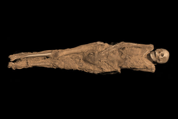 A tattoo was discovered on the thigh of a Sudanese woman who died 1,300 years. This CT scan 3D visualization shows her mummified remains.