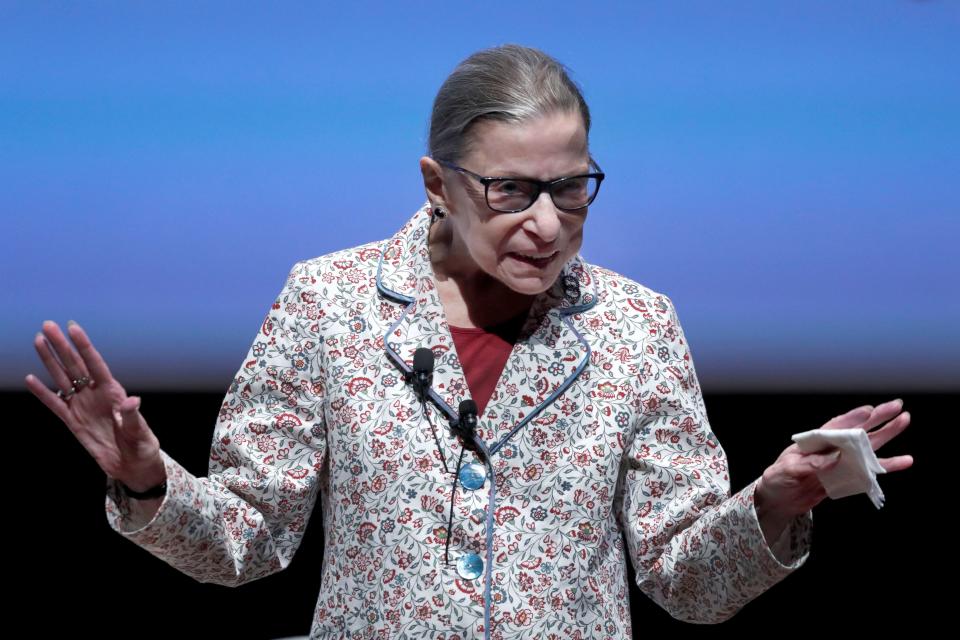 Supreme Court Justice Ruth Bader Ginsburg, here speaking in Chicago in September, is back in the hospital after experiencing fever and chills Friday night.