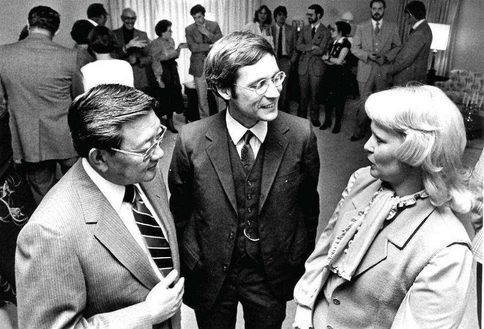 Dr. Gary Shanafelt, center, is among the guests at a welcome-to-McMurry event in 1981 at the home of McMurry College President Thomas Kim, left.