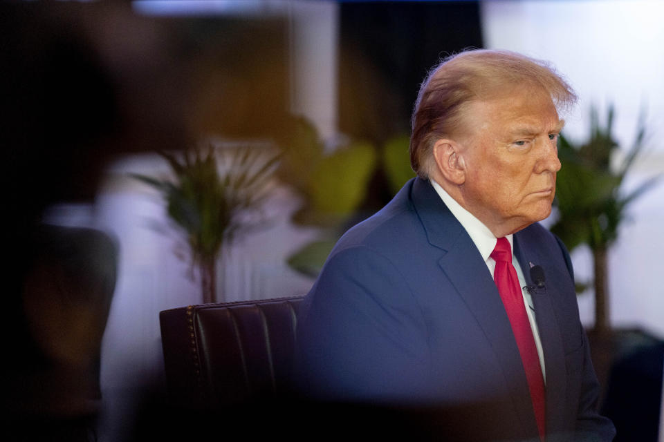 FILE - Republican presidential candidate former President Donald Trump participates in a virtual rally at Hotel Fort Des Moines in Des Moines, Iowa, Saturday, Jan. 13, 2024. A federal judge said Sunday, Jan. 14, that Trump can wait a week to testify at a New York defamation trial where he could face millions of dollars in damages after a jury concluded that he sexually abused columnist E. Jean Carroll in the 1990s. (AP Photo/Andrew Harnik, File)