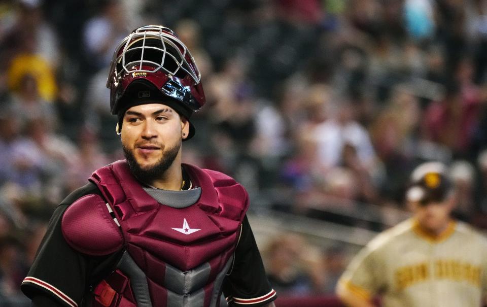 June 29, 2022; Phoenix, Arizona; USA; Diamondbacks catcher Jose Herrera (36) looks back at the umpire after a foul ball against the Padres during a game at Chase Field. Mandatory Credit: Patrick Breen-Arizona Republic