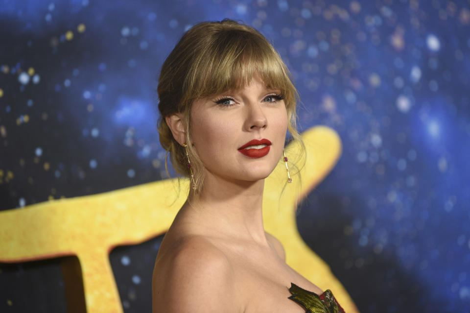 FILE - In a Monday, Dec. 16, 2019 file photo, Taylor Swift attends the world premiere of "Cats," at Alice Tully Hall, in New York. Taylor Swift and writer-director-producer Janet Mock will be honored at the GLAAD Media Awards for their advocacy for LGBTQ issues. Swift has been an outspoken proponent of the Equality Act and her video for her hit “You Need To Calm Down” featured prominent LGBTQ celebrities. The pop star will get the Vanguard Award during the ceremony in Los Angeles in April 2020. Mock writes and directs on the FX series “Pose.” She will receive the Stephen F. Kolzak Award, presented to a LGBTQ media professional.(Photo by Evan Agostini/Invision/AP, File)