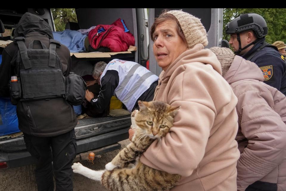 Residents are moved out of Vovchansk to escape fierce fighting between Ukrainian and Russian troops (Reuters)