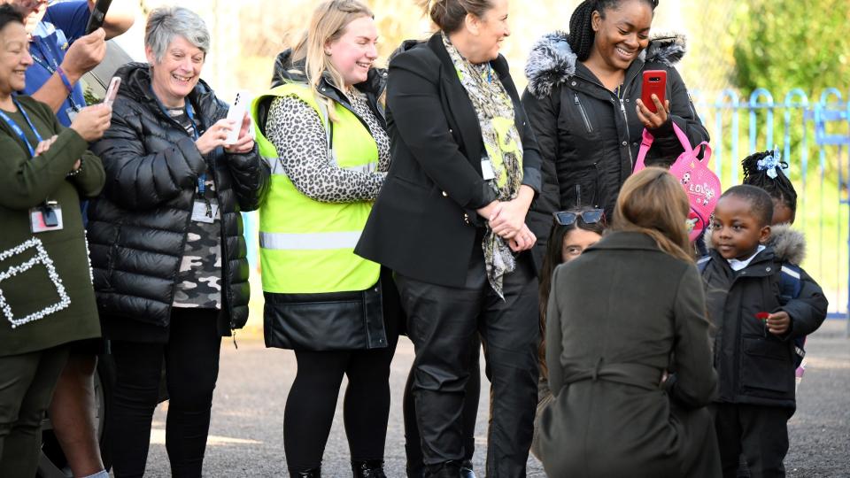 Giving a young boy her poppy