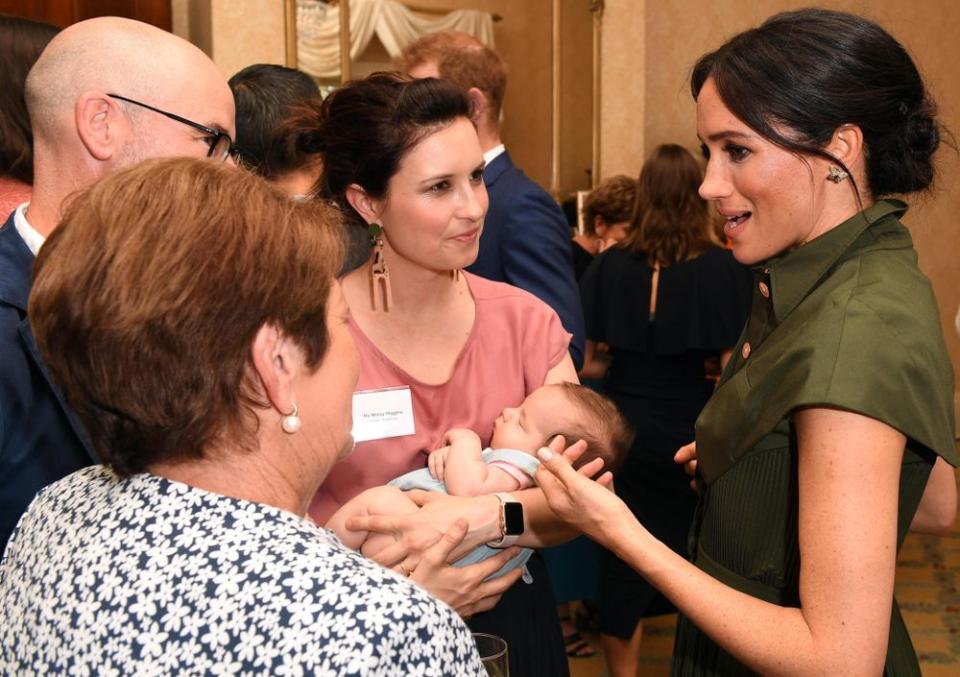 Meghan Markle speaks to singer Missy Higgins