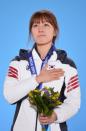 Gold medalist Seung-Hi Park of South Korea celebrates on the podium during the medal ceremony for the Short Track Women's 1000m