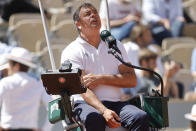French chair umpire Emmanuel Joseph looks up while Jessica Pegula of the U.S. plays Poland's Iga Swiatek during their quarterfinal match of the French Open tennis tournament at the Roland Garros stadium Wednesday, June 1, 2022 in Paris. (AP Photo/Jean-Francois Badias)