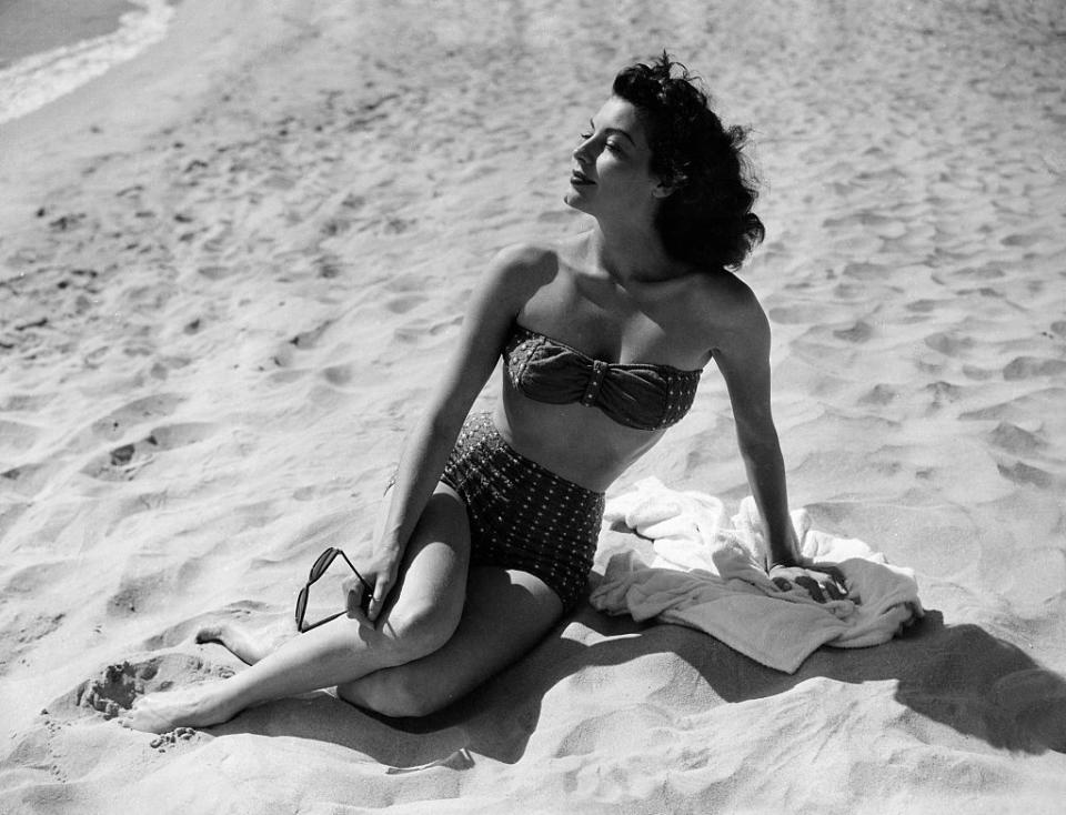 <p>Ava Gardner soaks up the sun while shooting <em>Pandora and the Flying Dutchman </em>in 1951.</p>