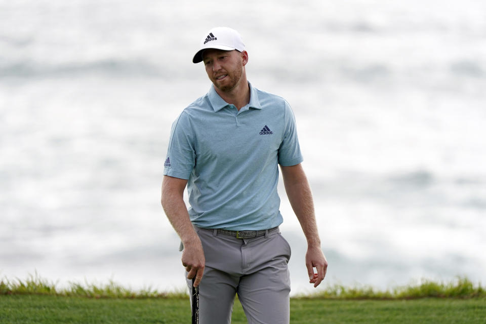 Daniel Berger reacts after missing a birdie putt on the ninth green of the Pebble Beach Golf Links during the second round of the AT&T Pebble Beach Pro-Am golf tournament Friday, Feb. 12, 2021, in Pebble Beach, Calif. (AP Photo/Eric Risberg)