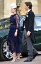 <p>Princess Beatrice wore a navy lace tiered Self-Portrait dress with champagne stilettos and a white fascinator while accompanied by her boyfriend Edoardo Mapelli Mozzi at Lady Gabriella Windsor's May 2019 nuptials. </p>