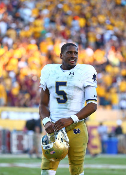 Nov 8, 2014; Tempe, AZ, USA; Notre Dame Fighting Irish quarterback Everett Golson (5) walks off the field following the game against the Arizona State Sun Devils at Sun Devil Stadium. Arizona State defeated Notre Dame 55-31. (Mark J. Rebilas-USA TODAY Sports)