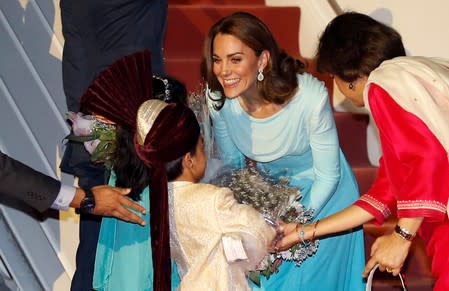 Britain's Prince William and Catherine, Duchess of Cambridge, arrive in Islamabad