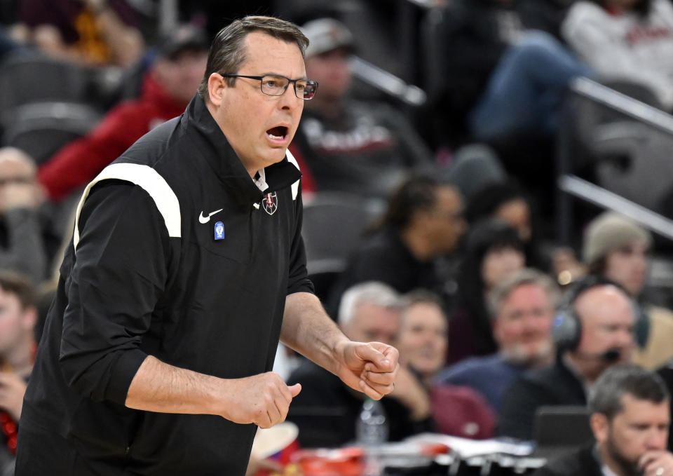 FILE - Stanford head coach Jerod Haase calls to his team against Utah during the second half of an NCAA college basketball game in the first round of the Pac-12 men's tournament on March 8, 2023, in Las Vegas. Stanford has more go-to shooting options as the Cardinal begin in coach Jerod Haase's eighth season. (AP Photo/David Becker, File)