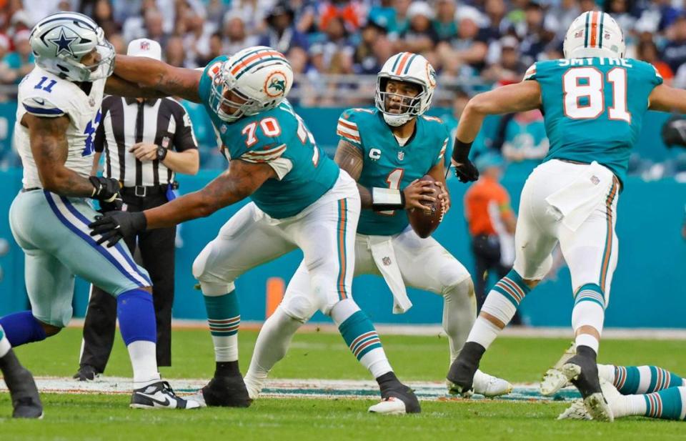 Miami Dolphins quarterback Tua Tagovailoa (1) sets up to pass in the second quarter against the Dallas Cowboys at Hard Rock Stadium in Miami Gardens, Florida on Sunday, December 24, 2023.